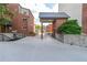 The property's exterior showcases a walkway and outdoor sitting area at 375 Ralph Mcgill Ne Blvd # 807, Atlanta, GA 30312