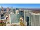 An aerial view of the city skyline and surrounding neighborhood at 855 Peachtree Ne St # 2912, Atlanta, GA 30308