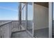 Condo balcony leading to a bright interior through sliding glass doors at 855 Peachtree Ne St # 2912, Atlanta, GA 30308