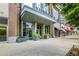 Viewpoint building entrance with planters and large windows in a thriving city center at 855 Peachtree Ne St # 2912, Atlanta, GA 30308