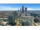 A panoramic skyline view showcasing modern high-rise buildings against a clear blue sky at 855 Peachtree Ne St # 2912, Atlanta, GA 30308