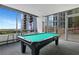 Game room with a well-maintained pool table, offering a recreational space with city views at 855 Peachtree Ne St # 2912, Atlanta, GA 30308