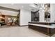 Open lobby area with reception desk, comfortable seating, and stylish decor at 855 Peachtree Ne St # 2912, Atlanta, GA 30308