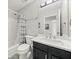 Bathroom featuring a vanity with dark cabinets, white countertop, shower over bath, and modern fixtures at 1091 Dunedin Trl, Woodstock, GA 30188