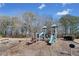 Community playground offers a fun, safe space for , with slides and climbing features in a well-kept outdoor area at 1091 Dunedin Trl, Woodstock, GA 30188