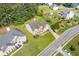 Beautiful home with a well-manicured lawn, mature trees, and a long driveway at 1516 Montauk Pt, Conyers, GA 30013