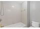 Bathroom features a white tiled shower and toilet at 1516 Montauk Pt, Conyers, GA 30013