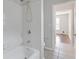Bathroom with bathtub/shower and tile floors at 1516 Montauk Pt, Conyers, GA 30013
