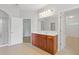 Bright bathroom featuring a large vanity, tile floors, and a glass shower at 1516 Montauk Pt, Conyers, GA 30013