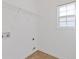 Simple laundry room with a window at 1516 Montauk Pt, Conyers, GA 30013