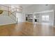 A living room is open to the kitchen and features a staircase leading to the second floor at 1516 Montauk Pt, Conyers, GA 30013