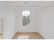 Bright, empty walk-in closet with large window at 1516 Montauk Pt, Conyers, GA 30013