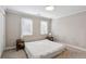 Bedroom with neutral carpet, white walls, and natural light from two windows at 265 Winding River Dr # G, Sandy Springs, GA 30350