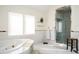 Bathroom featuring a jacuzzi tub and walk-in shower at 3290 Coachmans Ne Way, Roswell, GA 30075