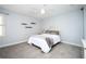 Cozy bedroom with plush carpet, ceiling fan, and serene natural light at 3290 Coachmans Ne Way, Roswell, GA 30075