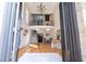 Bright, two-story foyer with hardwood floors, a grand staircase, and a decorative chandelier at 3290 Coachmans Ne Way, Roswell, GA 30075