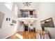 Inviting foyer with hardwood floors, high ceilings, and a view of the upper-level balcony at 3290 Coachmans Ne Way, Roswell, GA 30075