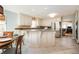 Kitchen with white cabinetry, granite countertops, stainless steel appliances and an eat-in dining area at 3290 Coachmans Ne Way, Roswell, GA 30075