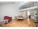 Bright living room with high ceilings, hardwood floors, and an open layout to the upper level at 3290 Coachmans Ne Way, Roswell, GA 30075