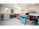 This office features neutral walls, carpet, a ceiling fan, and natural light, making it a comfortable and productive workspace at 3290 Coachmans Ne Way, Roswell, GA 30075