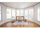 Office nook with desk, rolling chair and plenty of windows overlooking the backyard at 3290 Coachmans Ne Way, Roswell, GA 30075