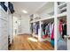 Well-organized walk-in closet with ample storage and natural light at 3290 Coachmans Ne Way, Roswell, GA 30075