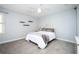 Serene bedroom featuring plush carpet, a ceiling fan, and neutral color palette at 3290 Coachmans Way Ne Way, Roswell, GA 30075