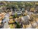 Aerial view showcasing the neighborhood's well-maintained homes and lush greenery at 5035 Foxberry Ln, Roswell, GA 30075