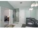 Spacious bathroom with double vanity sinks, walk-in shower, and white tile flooring at 5035 Foxberry Ln, Roswell, GA 30075