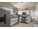 Well-equipped kitchen featuring granite countertops, stainless steel appliances, and ample cabinet space at 5035 Foxberry Ln, Roswell, GA 30075