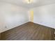 Spacious bedroom featuring wood-look flooring and neutral paint colors at 1958 Brittania Cir, Woodstock, GA 30188