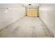 Spacious single-car garage offers potential for storage and parking at 1958 Brittania Cir, Woodstock, GA 30188