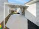 Covered patio with concrete flooring, perfect for outdoor entertaining at 1958 Brittania Cir, Woodstock, GA 30188