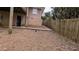 Backyard with a wooden fence, and some ground cover at 2689 Rollingwood Se Ln, Atlanta, GA 30316