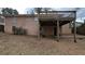 Spacious backyard with a deck and walkout basement entrance at 2689 Rollingwood Se Ln, Atlanta, GA 30316