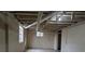 Unfinished basement with exposed ceiling, pipes, and small windows at 2689 Rollingwood Se Ln, Atlanta, GA 30316