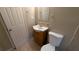 Bathroom featuring a wood vanity, sink, mirror, and toilet at 2689 Rollingwood Se Ln, Atlanta, GA 30316