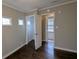 Bedroom featuring a closet and doorway with dark hardwood floors at 2689 Rollingwood Se Ln, Atlanta, GA 30316