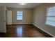 Bright bedroom with hardwood floors and windows for natural light at 2689 Rollingwood Se Ln, Atlanta, GA 30316
