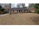 Charming single-story home with black shutters, and a well-maintained front yard at 2689 Rollingwood Se Ln, Atlanta, GA 30316