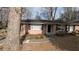 Well-maintained brick home with a new roof and mature trees at 2689 Rollingwood Se Ln, Atlanta, GA 30316