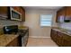 Updated kitchen with stainless appliances and granite countertops at 2689 Rollingwood Se Ln, Atlanta, GA 30316