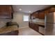 Galley-style kitchen featuring granite countertops and stainless steel appliances at 2689 Rollingwood Se Ln, Atlanta, GA 30316