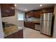 Kitchen featuring stainless steel appliances, granite countertops, and tile flooring at 2689 Rollingwood Se Ln, Atlanta, GA 30316