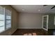 Open living room featuring hardwood floors, recessed lighting, and natural light at 2689 Rollingwood Se Ln, Atlanta, GA 30316
