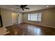 Living room with hardwood floors, a window, and neutral wall paint at 2689 Rollingwood Se Ln, Atlanta, GA 30316