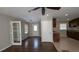 Inviting living room and kitchen area with wood floors, granite countertops and stainless steel appliances at 2689 Rollingwood Se Ln, Atlanta, GA 30316