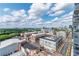 Stunning aerial view of the city skyline, buildings, and blue skies with fluffy white clouds at 361 17Th St # 1516, Atlanta, GA 30363