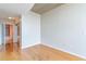 Bright bedroom with hardwood floors, a walk-in closet, and a view of the bath at 361 17Th St # 1516, Atlanta, GA 30363