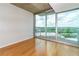 Bright living room featuring hardwood floors and large windows with stunning views at 361 17Th St # 1516, Atlanta, GA 30363